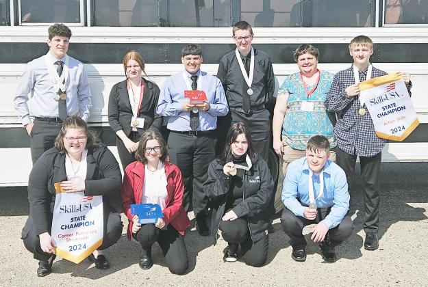 JCC STATE AWARD WINNERS at SkillsUSA competition, from the left: Front Row - Hailey Stafford-Thompson, Rue Kuhl, Jadeyn Grobler, and Bryce Frederick. Back Row - James Stalions-Nixon, Amillia Gentert, Sergio Valles, William Rademacher, Chapter Advisor Olivia Reuter, and Zeke Burki.