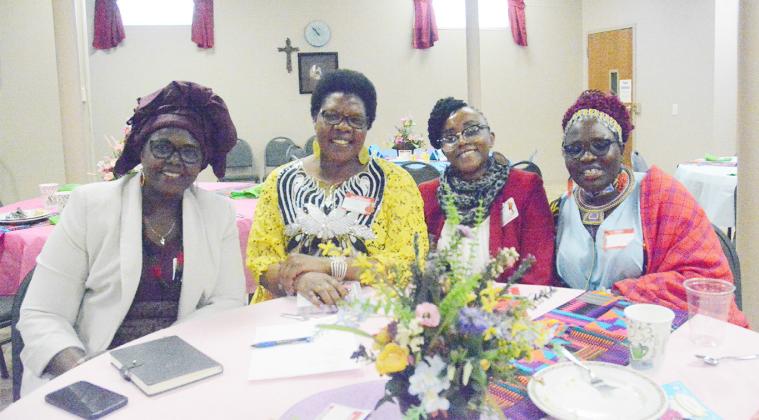 KENYAN WOMEN associated with the United Methodist Church who spoke at the Tecumseh United Methodist Church included, from the left: Jane, Ann, Eunice, and local Pastor Makena Riungu.