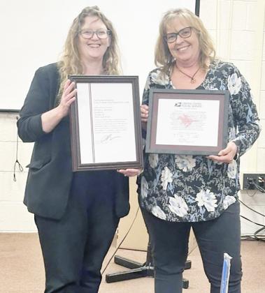 TECUMSEH POSTMASTER BRENDA WERMAN, right, was sworn in by Melissa Thienel, Manager of Postal Operations .
