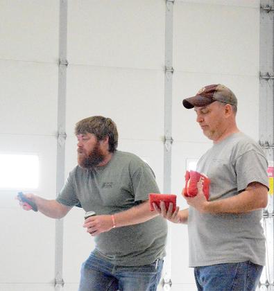 KALEB KUHLMANN, LEFT, AND JOSH CRANE won the Cornhole Tournament held during the Plager for a Purpose event at the Tecumseh Fire Hall on Saturday, March 16. Nine teams were registered for the tournament. The Plager for a Purpose Board hopes to expand the tournament next year as well as expanding other offerings at their events.