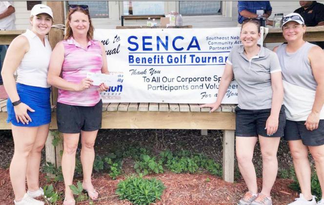 WINNING FIRST PLACE in the 2nd Flight of the SENCA Golf Tournament was the Meyer Team with a score of 69. They are, from the left: Reba Burgett, Amber Meyer, Tonya Sandfort, and Cheryl Doty.