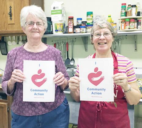 MARY LEMPKA, LEFT, AND LORETTA POPE prepare meals at SENCA in Tecumseh, promoting SENCA’s mission of improving lives and strengthening communities.