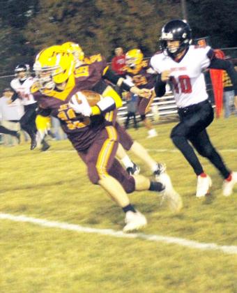  STERLING’S TRENTON PEERY (19) broke away and ran down the field for the Jets first touchdown against the Meridian Mustangs.