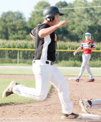 TANNER KERNER (11) advances to first and then turned around and dashed to second on a throwing error by EMN in action played on July 31st.