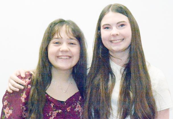 JUBILEE MATKINS, LEFT,AND HARMONY MATHES-RIENSCHE qualified for the State Speech Contest in Class D-2.