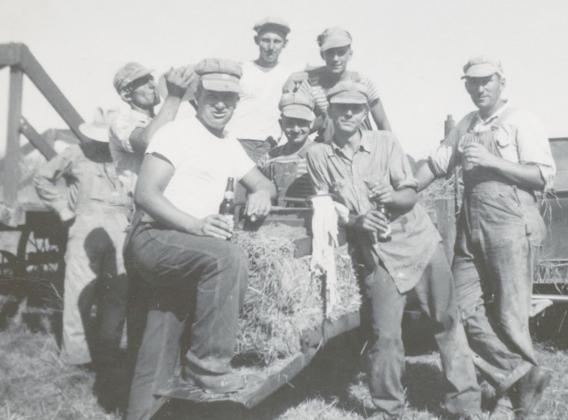 THE HAYING CREW on the Pella Farm in the mid-1940s, from the left: Martin Pella, John Sobotta, Richard Pella, Clem Pella, unknown, unknown, Joe Pella, Sr.