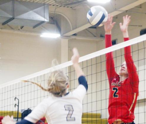THE LADY THUNDERBIRDS’ Ava Berkebile (2) blocks this shot against HTRS in a triangular held on their home court.