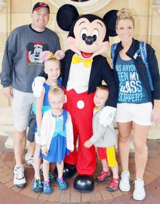 ADRIAN ALLEN and wife, Alyssa, with their children, from the left, Harper, Hadley, and Kyler.
