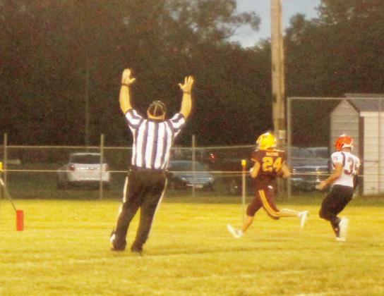 TOUCHDOWN STERLING AS WYATT RATHE (24) breaks away for a touchdown early in the Jets game against the Dorchester Longhorns on October 1.