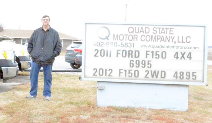 MARK HELMBERGER has established a used auto business in the town of Sterling along Highway 41.