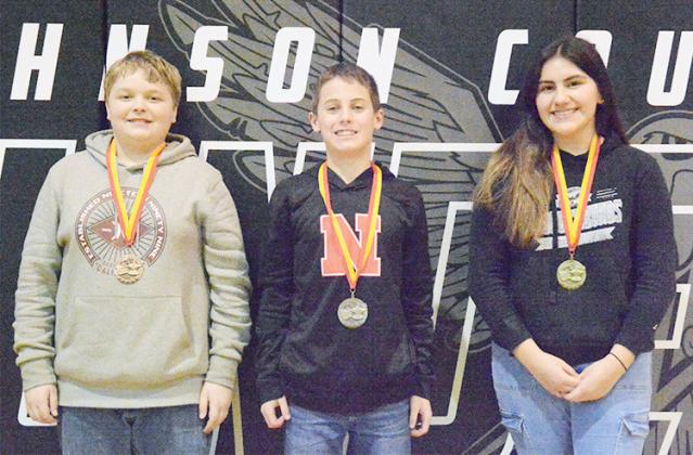 ROUND 2 SPELLING BEE WINNERS IN 7TH GRADE, from right to left: Heidi Reyes, 2nd-Jackson Gottula, 3rd-Wyatt Lueders, all of Johnson County Central.