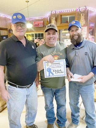 DALE BARNES of Virginia, center, was the 1st Place winner of the Sterling Ruritans’ Chili Cooking Contest in the Mild category on Saturday evening, March 9. Presenting the award were President Richard Rambo, left, and Vice President Ben Briggs.