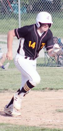TECUMSEH JUNIORS’ RYAN BOHLING takes off for first base on a hit in the outfield.