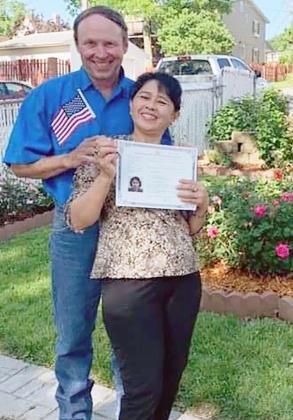 RON KETTELHAKE AND HIS WIFE, EVELYN, now a proud U.S. Citizen.