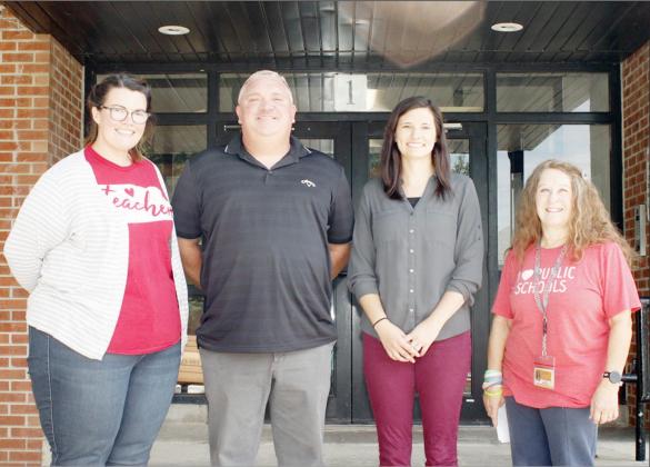 NEW TEACHERS AT JOHNSON COUNTY CENTRAL this year are, from the left: Susan Sisco, Ryan Haughton, Leah Phillips, and Vicki Mulholland.