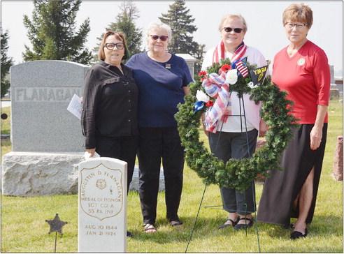 ATTENDING THE MEDAL OF HONOR SERVICE for Augustin Flanagan Sunday were, from the left: Kathi (Flanagin) Mercure of Tecumseh; Sarah Mueller of Tecumseh; Angela Mandl, president of Tecumseh American Legion Auxiliary Unit #2; and Vicki Ozenbaugh, Department President of the American Legion Auxiliary.