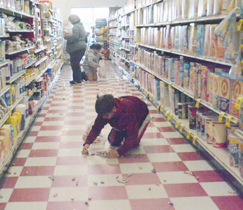 THE EASTER EGG HUNT AT TECUMSEH CENTRAL MARKET was back this year, held on Saturday morning, March 16 with candy in the aisles for area children to scoop into their bags or baskets.