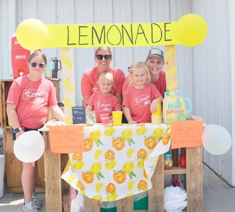 PART OF THE 4TH OF JULY WEEKEND SCENE in Tecumseh was this lemonade stand outside Kerner Ace Hardware. From the left: Presley Juilfs, Tori Juilfs standing in front of Ashley Juilfs, and Adalynn Meyer standing in front of Kelsi Meyer.