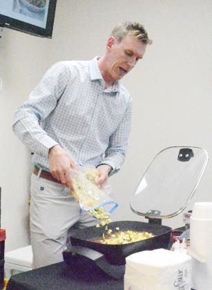 MITCH RIPPE, Nebraska Beef Council Director of Nutrition and Education, showed those who attended his cooking class at Johnson County Hospital on Monday evening, February 5, how to make delicious, heart-healthy dishes.
