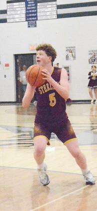 OWEN UHER gets ready to take a shot during Friday night’s game.
