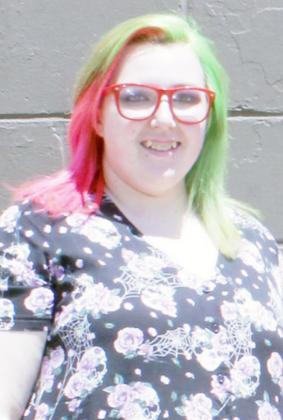 Abbie Allen Enjoys Lifting One’s Spirits with Bright Hair Colors