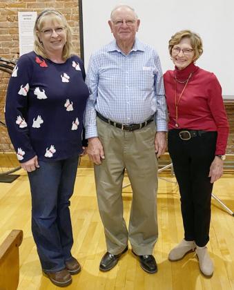 KIM ROBISON CROOK, NORMAN BOONE, AND VICKY GOBBER, left to right, gave the program about Elk Creek’s history.
